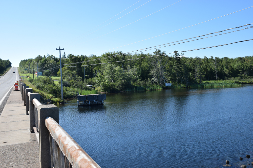 View of lot from Baddeck River bridge.