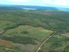 Oblique aerial view of property.