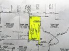 The Doyles Road, Margaree Forks property is highlighted in yellow on this map. The property is surrounded on three sides by Crown land.