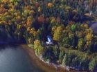 Aerial view of cabin on lot 23-6. basic cabin - needs some work. Access road to cabin.