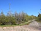 The power line is visible in this photo of the intersection of Millar Road and Melrose Hill Road.