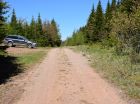 At the top of the hill is the midpoint of the property, on the right.