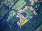 The property is highlighted in yellow on this aerial view of the property and surrounding area.