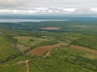 An aerial view of the property and surrounding region.