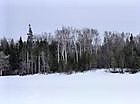 A wintertime view of the property, from the frozen Bras d'Or Lake.