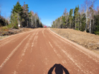 Lot 23-7 and Lot 23-8 are on left side of this road - to top of hill and beyond.