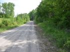 The lot features 350 feet of road frontage on MacInnis Island Road, a maintained, public road.